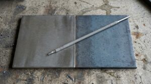 Steel plates on workbench 20260919194020